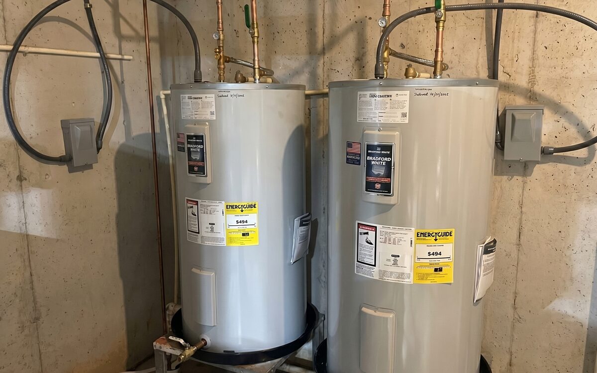 Installed residential water heaters with clean plumbing connections